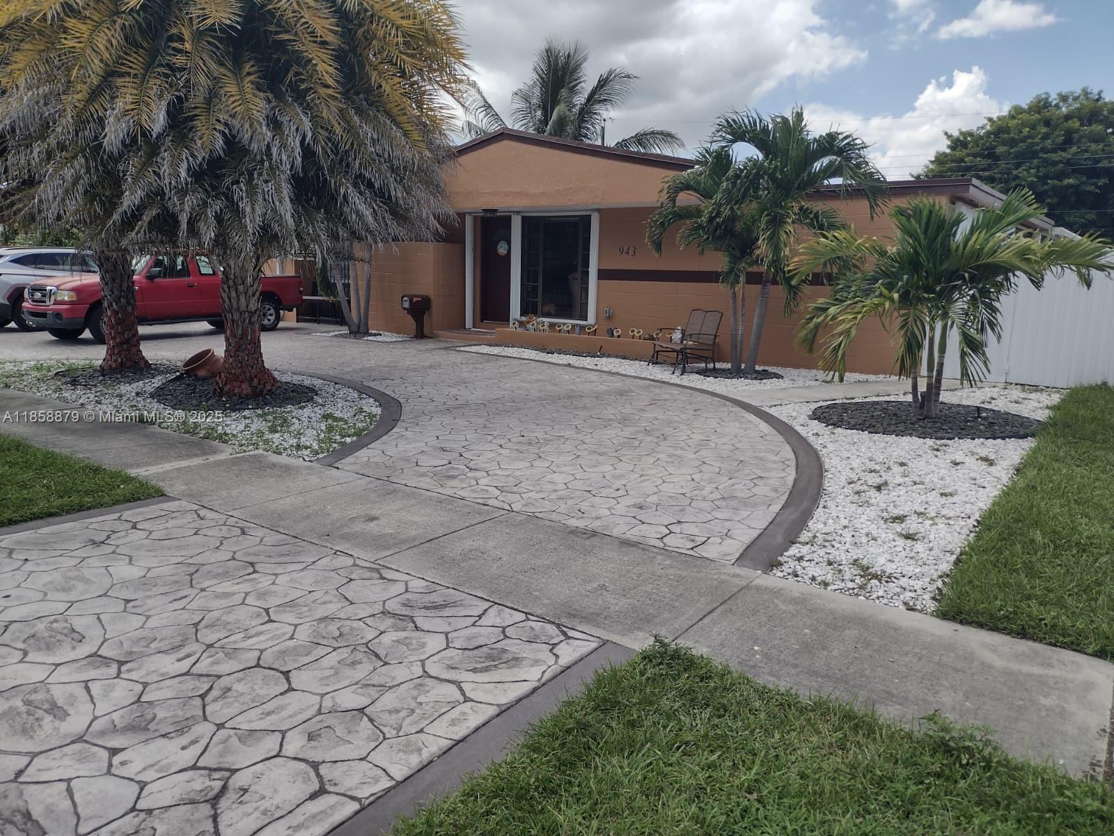 Welcome to this charming home! Centrally located. Circular driveway adds curb appeal, making this well-maintained home stand out the neighborhood. Covered carpot currently used as a terrace, ample family room plenty of natural light. AC replaced in 2020. New kitchen cabinets with granite countertops and stainless steel appliances. Accordion hurricane shutters in all windows, shingle roof is around 17 years old.