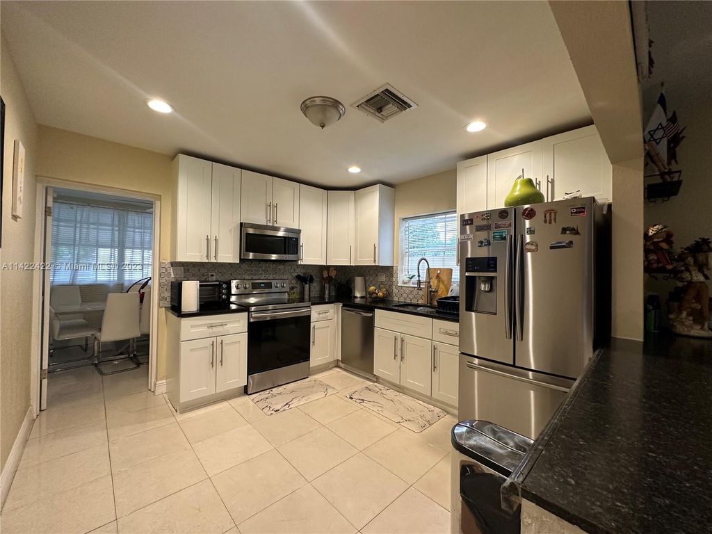 Photo of 1419 N 14th Ave N, Lake Worth, FL 33460 (MLS # A11422422)