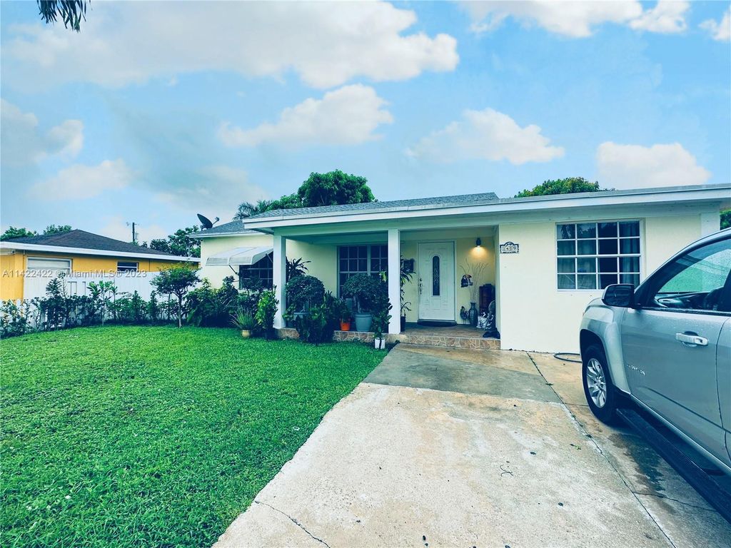 Photo of 1419 N 14th Ave N, Lake Worth, FL 33460 (MLS # A11422422)