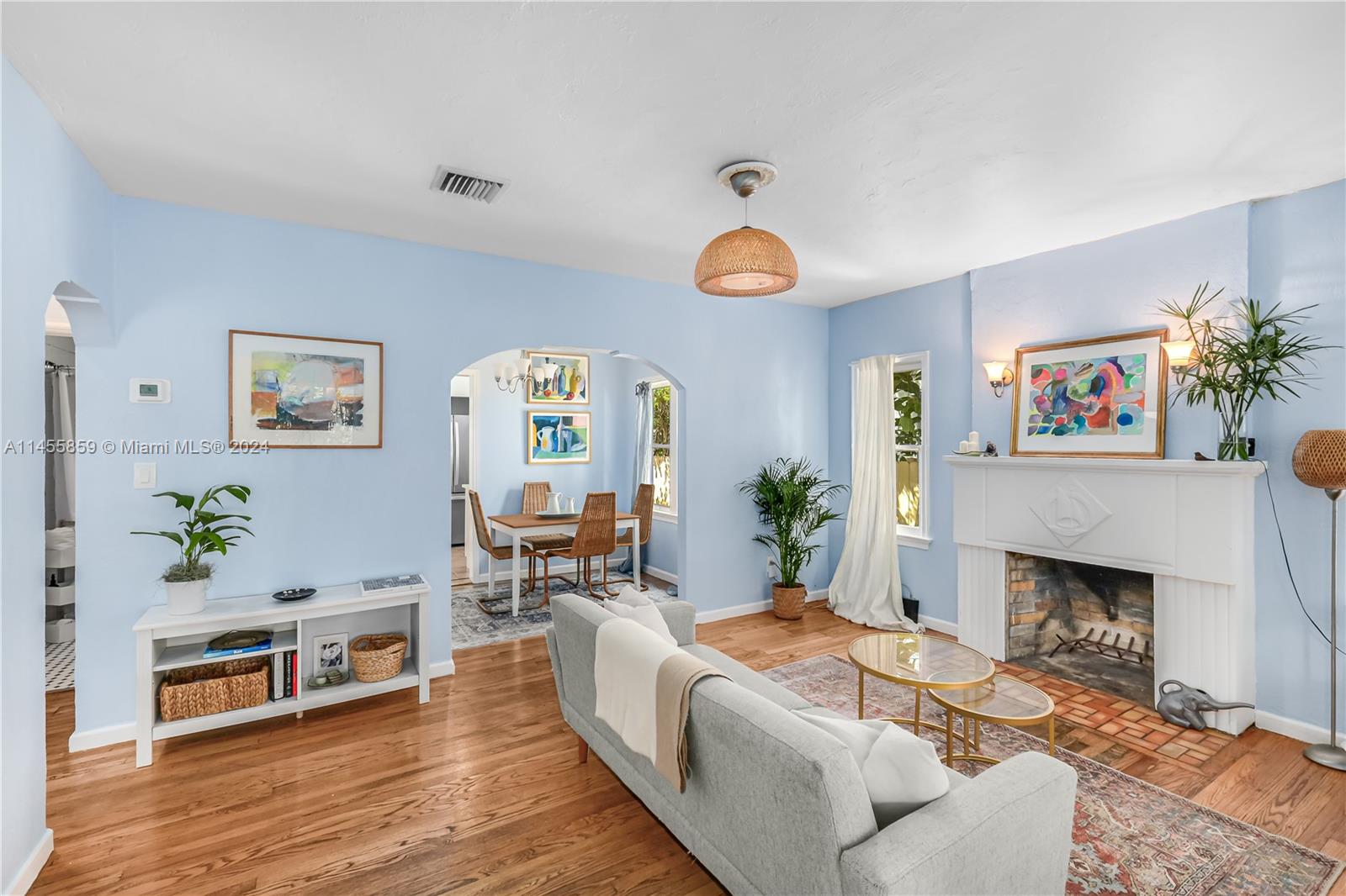 Welcome to highly sought-after Buena Vista, a unique enclave right next to the Design District, Midtown & Wynwood. This beautiful Craftsman home welcomes you with a white picket fence, an enclosed front porch, 2 bedrooms, 1 bath with room for a 2nd bath & large closets, original hardwood floors, working fireplace, Florida room & a separate cottage to customize as an office, guest suite, art studio, or home gym ! The large covered back porch leads to a lush tropical garden with koi pond & seamlessly blends the indoor & outdoor living spaces. Kitchen has quartz counters, new appliances & pantry. Additional features: updated electric panel and wiring, PVC & copper pipes, new AC, 2018 shingle roof, sprinkler system. This exceptional location is minutes from the hottest neighborhoods in Miami.