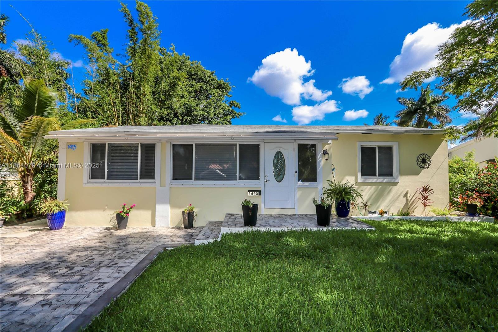 Beautiful 3-bed, 2-bath home in one of Hollywood’s most sought-after neighborhoods. The interior is filled with natural light, highlighting the timeless charm of original hardwood floors in the living and bedroom spaces. Beautiful kitchen with marble countertops, stainless steel appliances, and tile flooring. French doors open to a private fully fenced backyard retreat with a spacious covered wood deck, spa hot tub, and lush landscaping. Complete with a newer roof, a large storage shed, and spacious yard with plenty of room to design your dream pool! With an unbeatable location just minutes to the beach, FLL International Airport, and plenty of shops and dining!