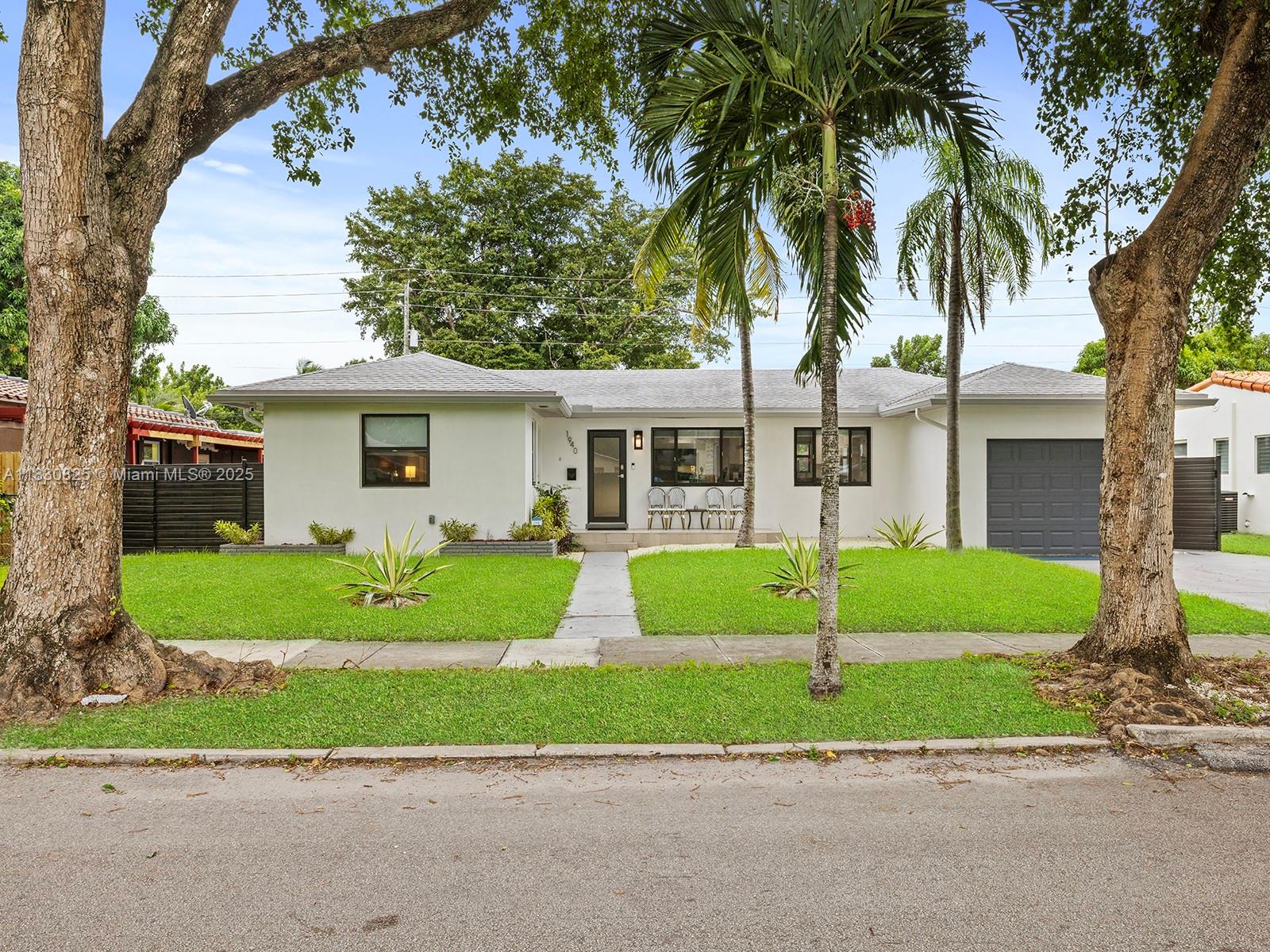 Experience unparalleled luxury just minutes from downtown Hollywood and the beach. This 5-bed, 3-bath retreat isn't just a house; it's a turn-key executive retreat with magnificent finishes, a well-thought-out open-concept layout, and exquisite furnishings and fittings. Fully furnished—just bring clothes, a toothbrush, and your pickleball racket! Enjoy a new roof, AC, impact windows, hot tub, and pickleball court on an oversized lot. Modern interior with porcelain tile, gourmet quartz kitchen, new stainless appliances, chic floating bar, Stylish fireplace, plus oversized lot with brand-new pickleball court and hot tub. Minutes from Hollywood Beach, Gulfstream Park, The Hard Rock Casino, shopping, and dining—your private resort with easy urban access!