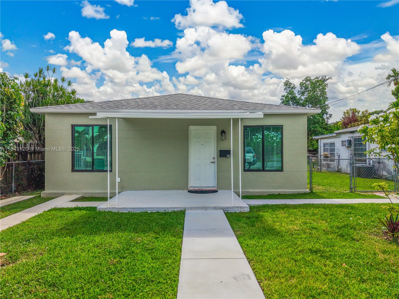 Nestled on a spacious 7,200 sqft duplex-zoned lot, this charming home has been meticulously renovated and expanded from its original 2-bedroom, 1-bathroom layout to now offer 3 bedrooms and 2 bathrooms. The property boasts a brand-new kitchen, new bathrooms, new impact windows, and newly installed laminate wood flooring throughout, except in the bedrooms. Additionally, it features new electrical and plumbing systems. New roof installed in 2023, and AC unit in 2021. All renovations were completed with proper permits. Conveniently located, this home provides easy access to Downtown, Calle Ocho, Coral Gables, Coconut Grove, Brickell, the MIA airport, and the Dolphin Expressway.