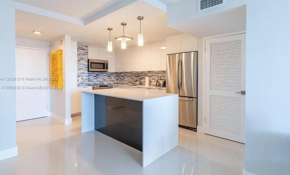 Completely and beautifully remodeled 1 BR / 1.5 Bath in the most desirable area of Brickell. Porcelain floors, modern kitchen with quartz countertops, center island, and high-end appliances. Granite counters in both bathrooms and glass shower in the master bath. Closets built-ins. Beautiful views of the bay and Brickell Skyline. . Amazing location a bridge away from Key Biscayne and minutes away from all the excitement of downtown Brickell, world-class restaurants, shops and entertainment. This condo also offers many amenities such as marina, pool, spa, sauna, BBQ area, available additional storage, attended lobby, and many more. The unit comes with an assigned parking space and available guest parking.