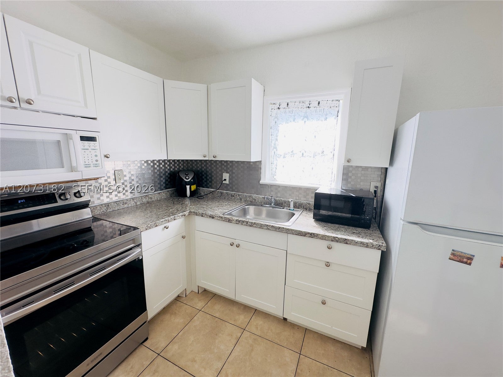 301 NW 37th St