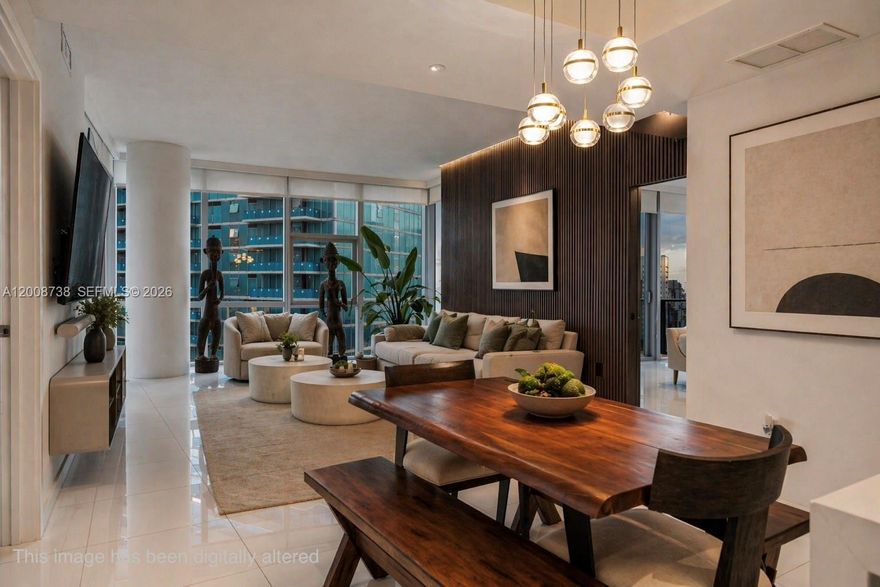 Welcome to Residence 1412 at Paramount Miami Worldcenter. This iconic luxury tower is known for having the most amenities in the world. Located in the heart of Downtown Miami, this expansive 3-bedroom + den residence offers 2,165 sq ft of interior living space with 10-ft floor-to-ceiling windows that flood the home with natural light.

Enter via private elevator into a thoughtfully designed layout featuring spacious living and dining areas, sleek European-style kitchen cabinetry, premium appliances, and spa-inspired bathrooms. The oversized terrace seamlessly extends your living space, perfect for entertaining or relaxing while enjoying city views.

Paramount delivers an unmatched resort-style lifestyle with over 40 world-class amenities, including multiple pools, full-service spa, state-of-the-art fitness center, boxing studio, basketball and racquetball courts, tennis courts, soccer field, golf simulator, yoga studio, and skydeck observatory. Residents also enjoy a jam room, game rooms, children’s play areas, and outdoor lounges.

With 24/7 concierge, valet, and security, plus direct access to Miami Worldcenter’s shopping, dining, and entertainment, this residence offers the ultimate in luxury urban living.