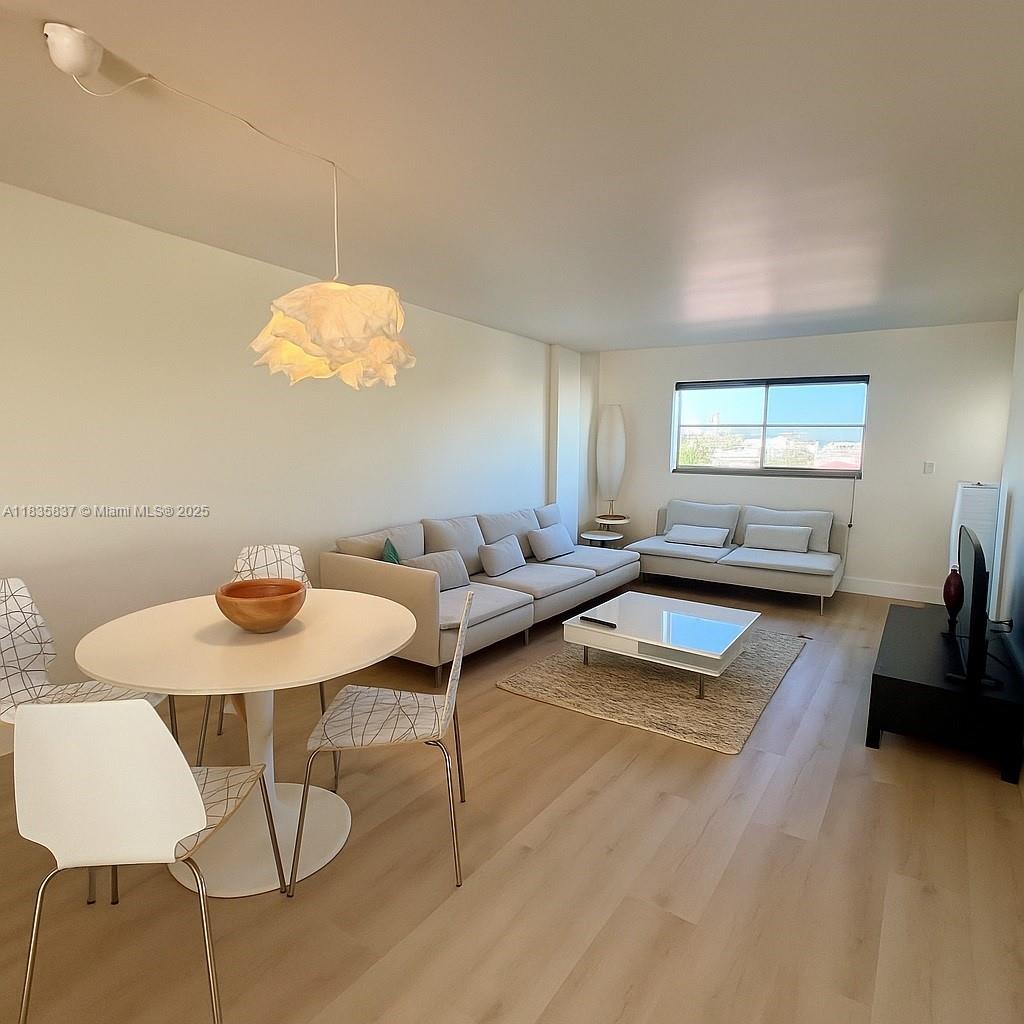 Nestled just one block from the vibrant Lincoln Road, this spacious 1-bedroom, 1.5-bath corner unit offers the perfect blend of comfort and convenience. Boasting an open-concept layout, this property features brand-new luxury vinyl floors that add modern elegance to its bright and airy design. Step outside onto your private balcony to enjoy the coastal breeze, or take advantage of the unit's ample storage with four large closets—a rarity in Miami Beach living. Located in a prime neighborhood, this property is ideal for investors or those seeking a stylish beachside retreat. Don’t miss the chance to own a slice of Miami Beach living! 40yr Recertification done in 2020, Roof in 2023.