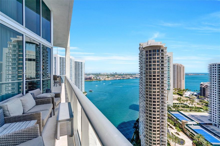 Experience panoramic vistas of the ocean and Biscayne Bay from nearly every room, whether it’s sunrise or sunset, in this sophisticated and sought-after '01 line residence at ICON BRICKELL, Tower I. This stunning 3-Bed, 2.5-Bath home features an impressive 2,044 Sq Ft of living area, complemented by a spacious 250 Sq Ft of balcony that invites outdoor relaxation. According to the developer’s floor plan, the thoughtful layout encompasses a total of 2,294 Sq Ft of stylishly designed interiors. This exquisite residence features a double-height ceiling that amplifies space and elegance, enhanced by dual air conditioning for tailored comfort. Two adjacent parking spaces add convenience and exclusivity.