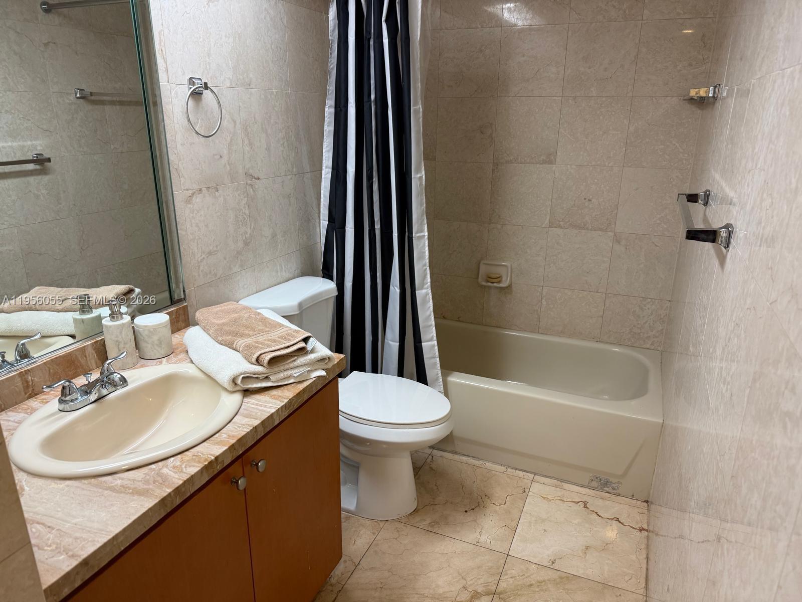 THE CARRIAGE HOUSE CONDO - Residential