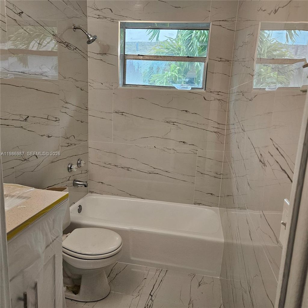 Photo of 27 SW 8th Ct #27, Hallandale Beach, FL 33009 (MLS # A11986987)