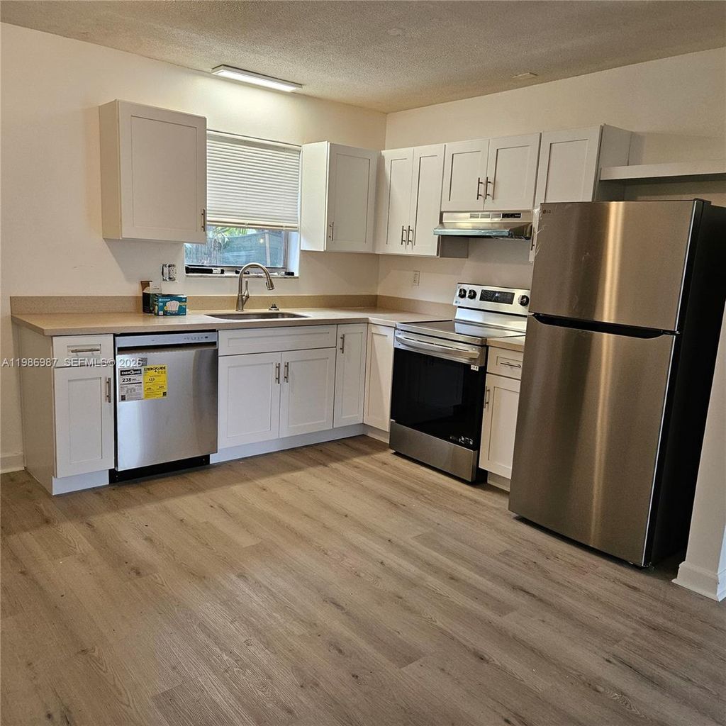 Photo of 27 SW 8th Ct #27, Hallandale Beach, FL 33009 (MLS # A11986987)