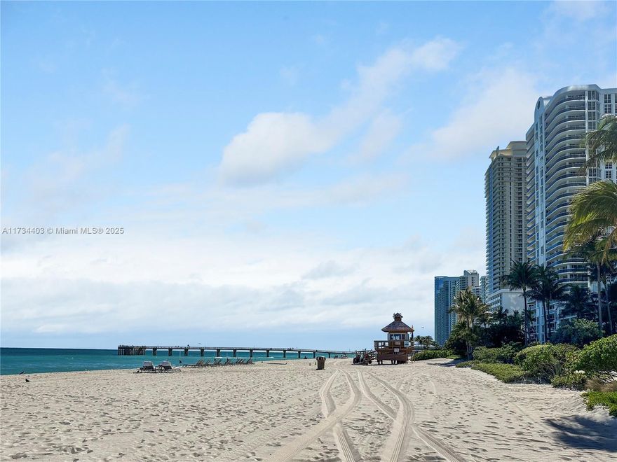 Just steps from the pristine Sunny Isles Beach, this bright and modern 1-bedroom, 1.5-bath condo offers the ultimate South Florida lifestyle in the sought-after Plaza of the Americas. This 767 sq. ft. unit features tile floors, ceiling windows, bright natural lighting, an interior balcony, and a modern kitchen with stainless steel appliances. HOA includes water, trash, internet, cable, a covered parking space, and a private storage locker. Enjoy resort-style amenities: a pool, jacuzzi, barbecue area, tennis and basketball courts, and a soon-to-be-completed gym. Laundry is on the same floor, with easy elevator access and 24-hour gated security. Live within walking distance of the beach, shops, restaurants, and more! INVESTORS: Okay to lease right away!