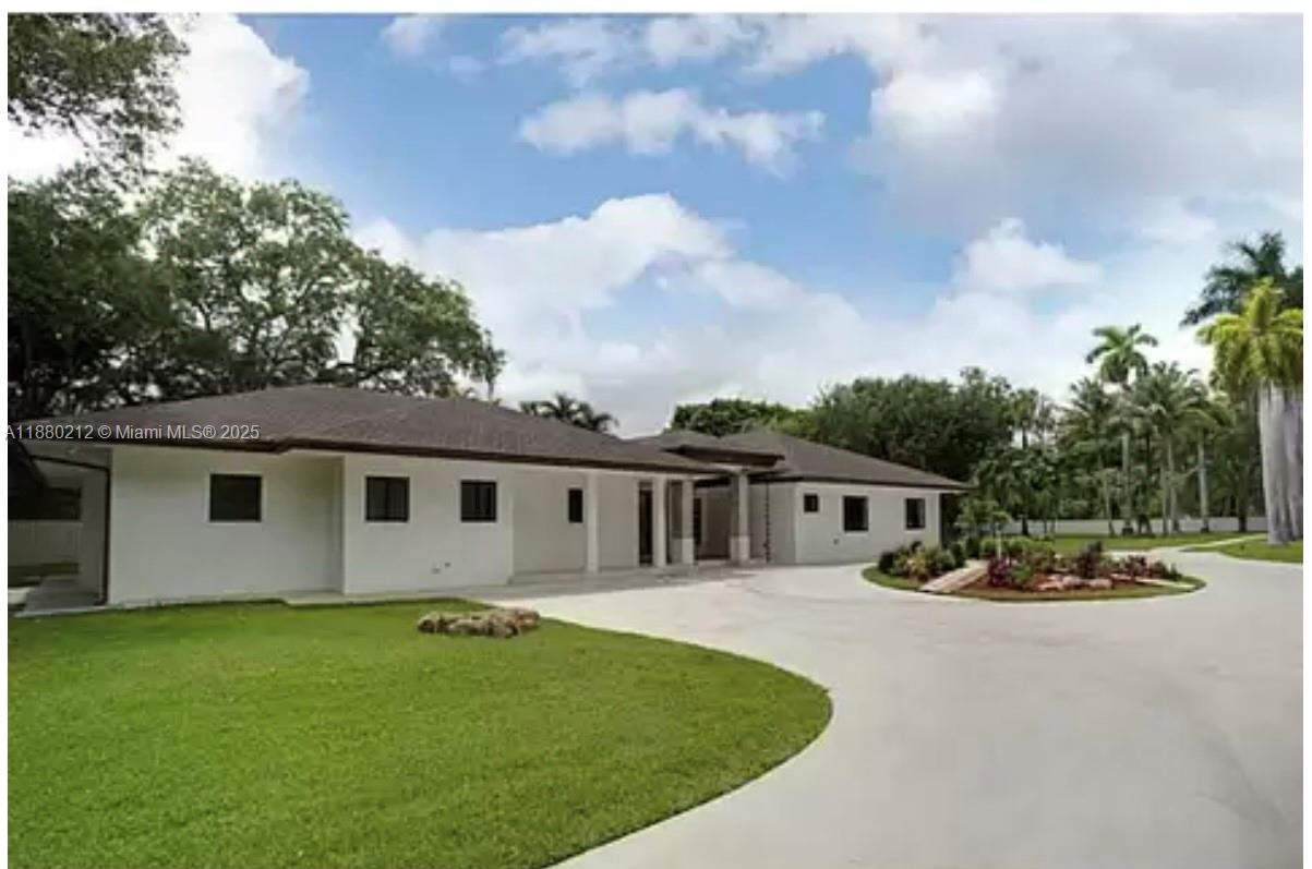 STUNNING COMPLETELY RENOVATED HOME,NO EXPENSE WAS SPARE. VERY BRIGHT AND SPACIOUS LAYOUT. TRAVERTINE FLOORS, STAINLESS STEEL APPLIANCES QYARTZ COUNTERTOPS,IMPACT WINDOWS, POOL WITH JACUZZI, HOUSE HAS TWO ENTRANCES AND IS GATED. CALL LISTINGS AGENT FOR SHOWING