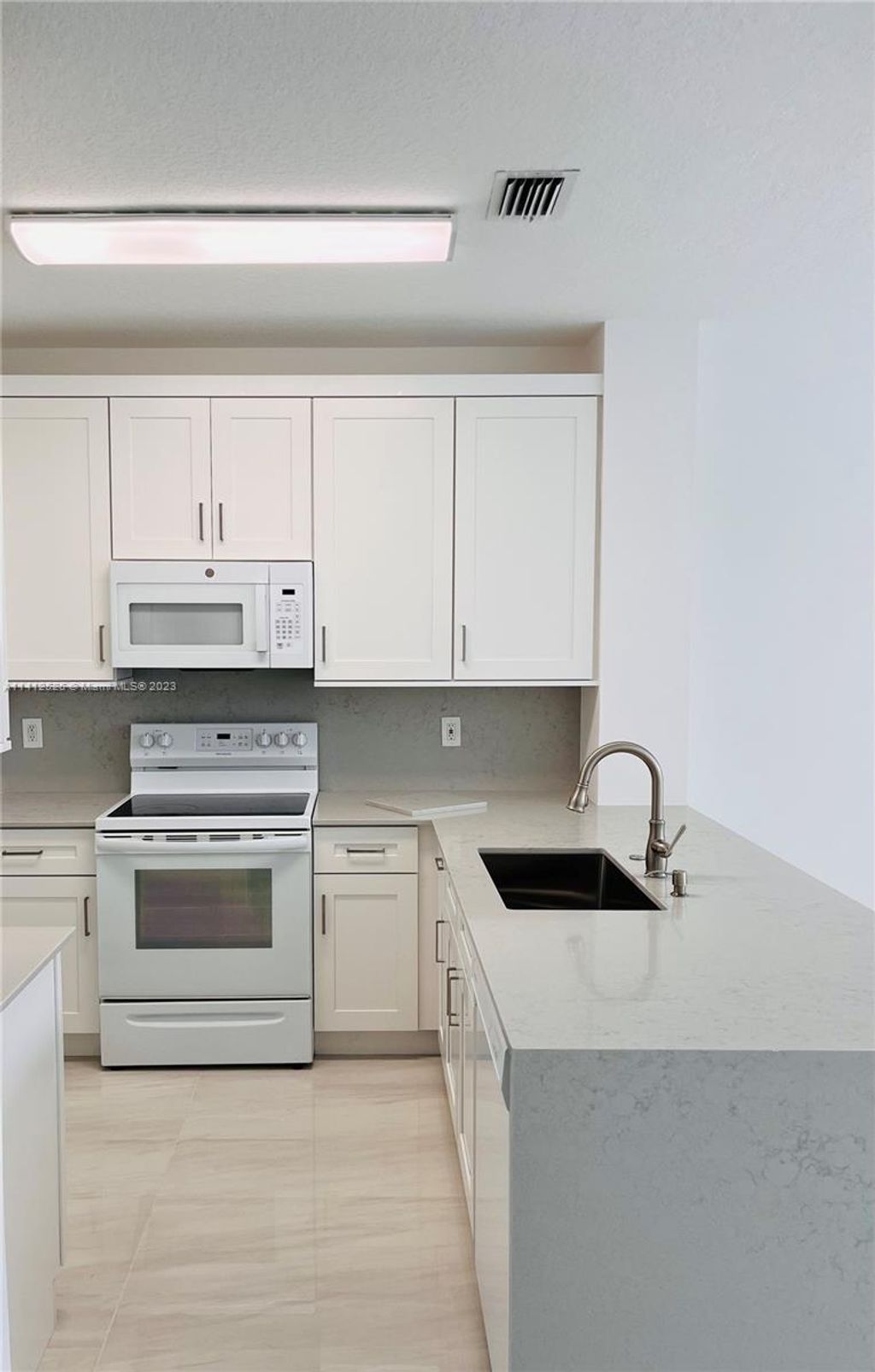 Photo of 4951 Grinnell St #4951, Lake Worth, FL 33463 (MLS # A11412526)