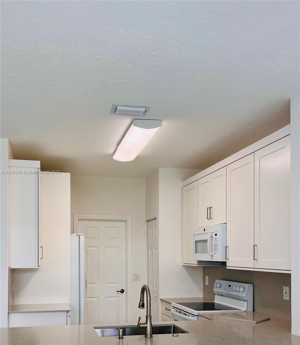 Photo of 4951 Grinnell St #4951, Lake Worth, FL 33463 (MLS # A11412526)