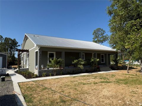 Photo of 7933 5th Ter, La Belle, FL 33935 (MLS # A12007072)