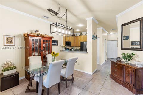 Photo of 9052 Plymouth Pl #9052, Tamarac, FL 33321 (MLS # A12063717)