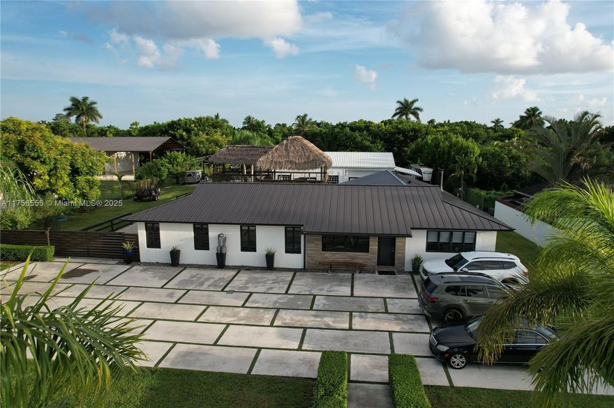 Discover a rare opportunity to own a truly unique and versatile property—perfect for those seeking space, tranquility, and limitless potential. Enjoy the best of both worlds: peaceful, private living just a short drive from the vibrant heart of Miami. Whether you're looking for a personal sanctuary or a smart investment, this property delivers.

The main residence features 3 spacious bedrooms and 3 full bathrooms, while a charming detached in-law suite (1 bed, 1 bath) adds even more value and flexibility—perfect for guests, extended family, or rental income.
The motivated seller is offering up to $10,000 toward closing costs to help make your move even easier. This is your chance to secure an extraordinary property with limitless potential.