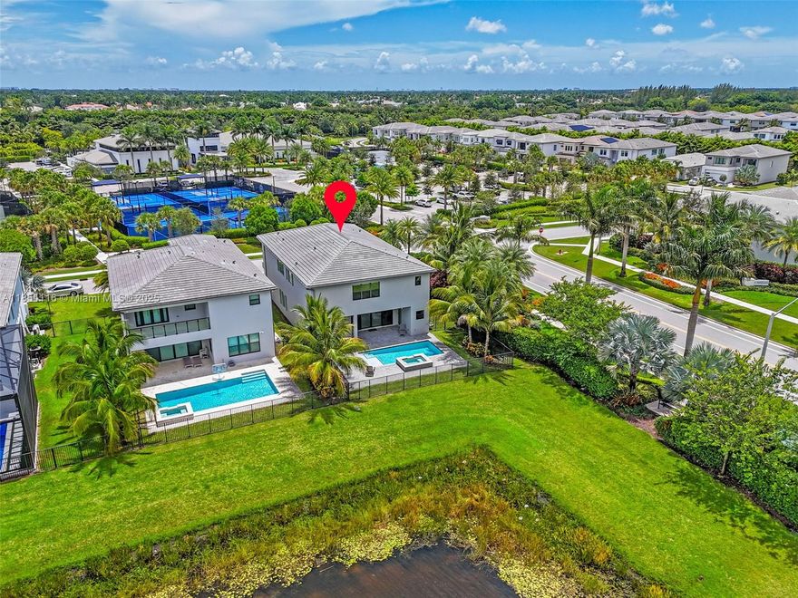 MAJOR PRICE REDUCTION! MOTIVATED SELLER! WILL NOT LAST!
Experience luxury living in Lotus with this stunning Polynesia model on a rare corner lakefront lot with PRIVATE POOL & JACUZZI. Includes upgraded summer kitchen (gas & water) and desirable east–west exposure. 
Walking distance to the spectacular clubhouse with pickleball, tennis, fitness, spa & full-service café. Inside: soaring ceilings, wall of windows, calming pool/lake views. Primary suite offers dual his & hers baths; chef’s kitchen with gas range, Italian porcelain floors & premium finishes. Additional features: loft, first-level in-law suite, cabana bath, and $180K+ in upgrades. DON'T MISS OUT THE BEST PRICED DEAL IN LOTUS! 

CONTACT ME FOR MORE INFORMATION