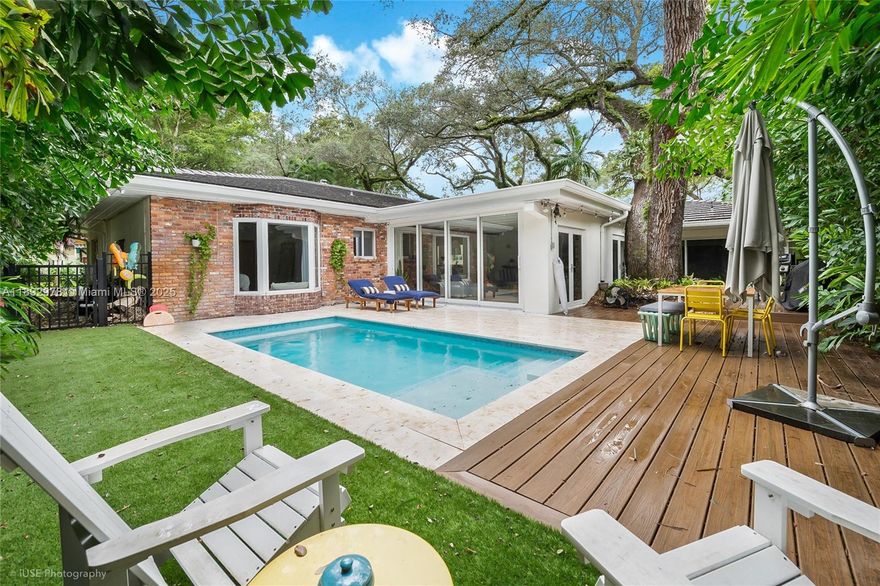 Welcome to your dream home! This 2,700 sq ft, 4-bed, 3-bath gem was fully remodeled with European design. The expansive ~1,000 sq ft open living area features high ceilings, exposed beams, and brick walls, giving it a unique charm. Brand new European cabinets and appliances in the kitchen. Lush greenery views throughout all the windows. Outdoor oasis with saltwater pool shaded by centenary oaks. The house is in a beautiful area, great for walks, across from a park with a playground and dog area, and near the Grove, Gables & South Miami. Top school district. One-car garage with laundry and storage + driveway for 2 cars. Ring security system, smart thermostat and appliances. Custom built closets. Outdoor electric and gas grills. Rent includes gardener, pool & pest service. Available Dec 1.