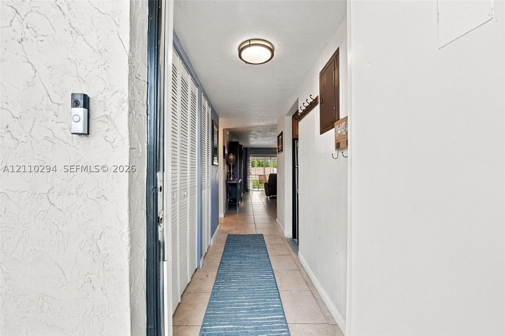 Photo of 8605 W Sample Rd #211, Coral Springs, FL 33065 (MLS # A12110294)