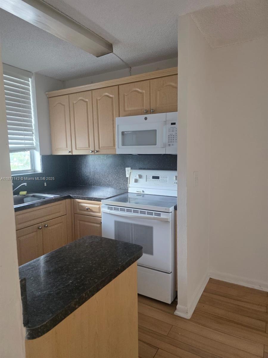 What a beautiful 1 bed 1 bath condo in the heart of North Bay Village on Treasure Island .This condo is on the 4th floor. A spacious living room, dining area, and kitchen, wood floors will make you feel at home .The building offers a GYM, Pool, on-site management, and a washer and dryer next to the unit on each floor. Minimum credit score 650 per condo association. Easy to show