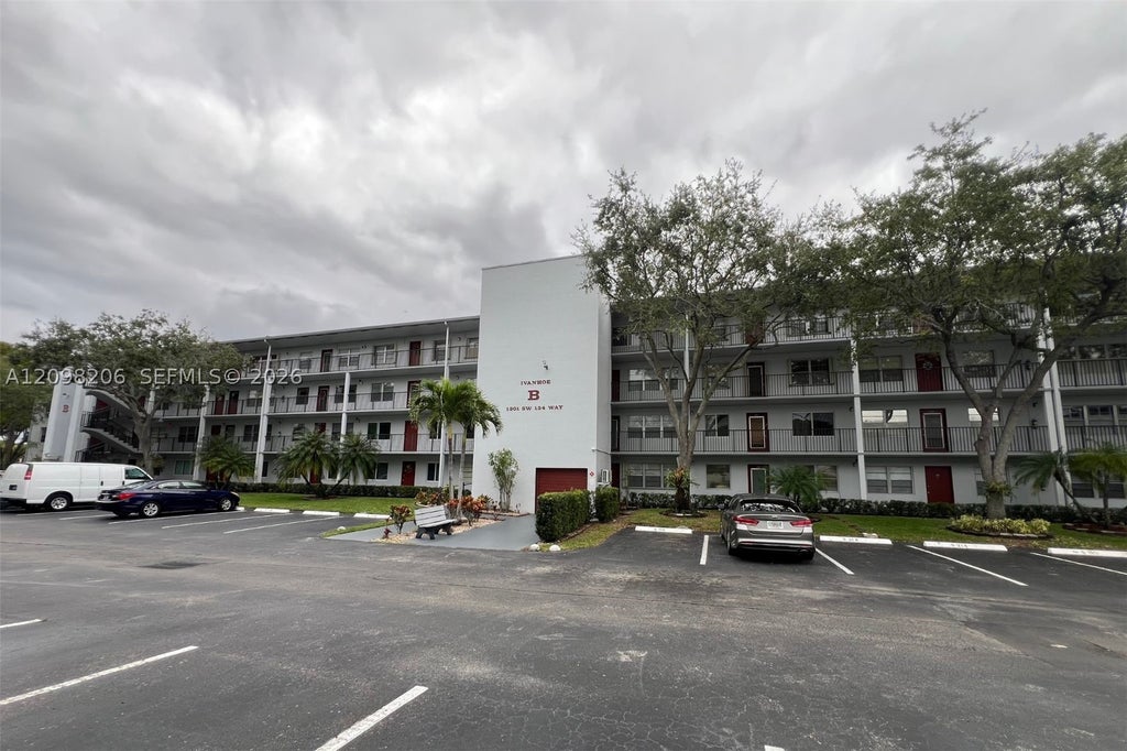Photo of 1301 SW 134th Way #208B, Pembroke Pines, FL 33027 (MLS # A12098206)