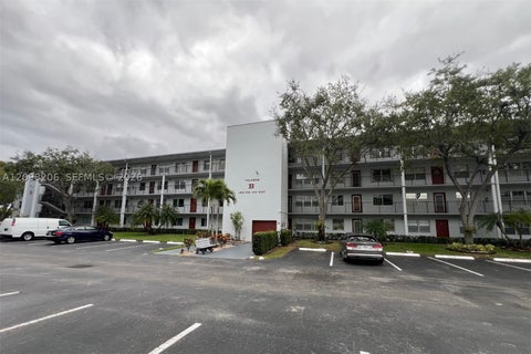 Photo of 1301 SW 134th Way #208B, Pembroke Pines, FL 33027 (MLS # A12098206)