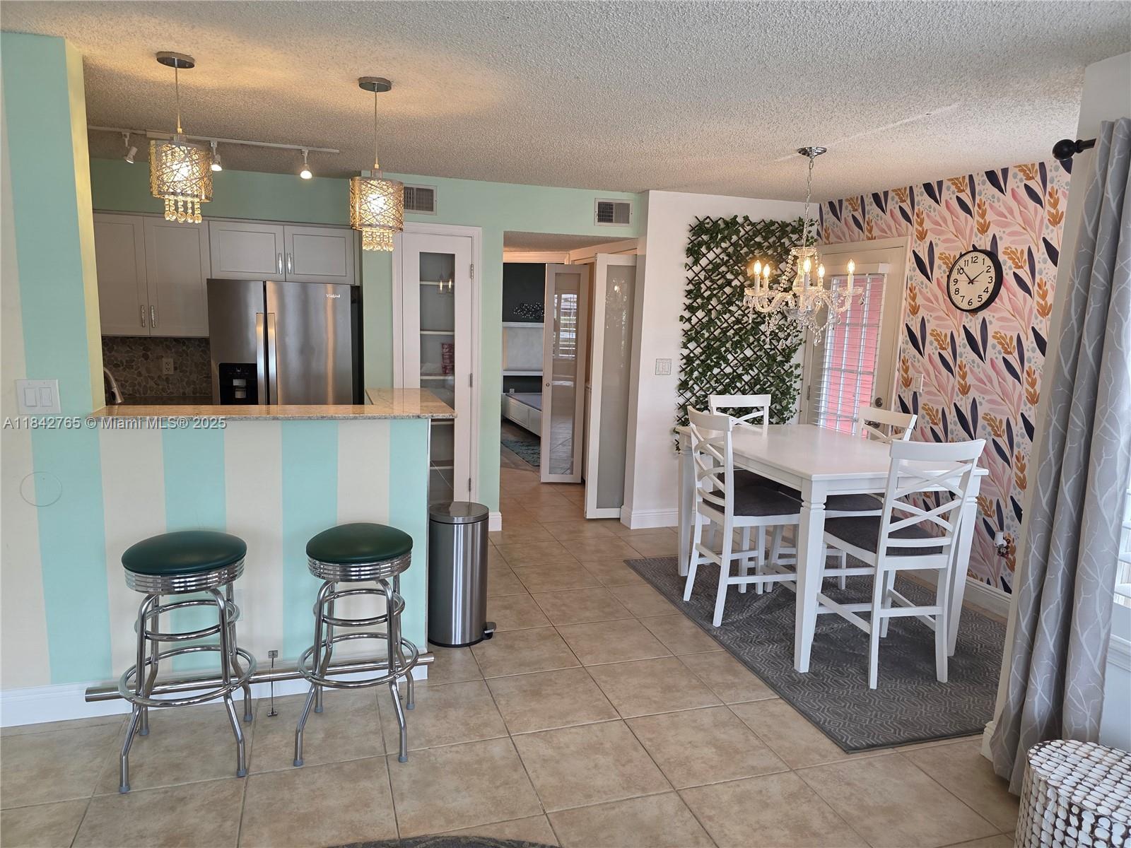 Beautifully Updated 1st Floor Condo with Serene Lake Views. Step into this beautifully updated 2-bedroom, 2-bath first-floor condo, perfectly situated in a peaceful lakefront setting with a highly convenient location. Enjoy the ease of indoor-outdoor living on the charming screened-in porch—ideal for morning coffee or relaxing evenings. Thoughtfully designed for comfort and versatility, this spacious unit is available furnished or unfurnished, making it the perfect place to call home. Residents also enjoy access to fantastic community amenities, including a swimming pool, jacuzzi, tennis courts, sand volleyball, and barbecue areas—perfect for entertaining or simply enjoying an active, resort-style lifestyle. Pets under 40lbs allowed Vacant and easy to show