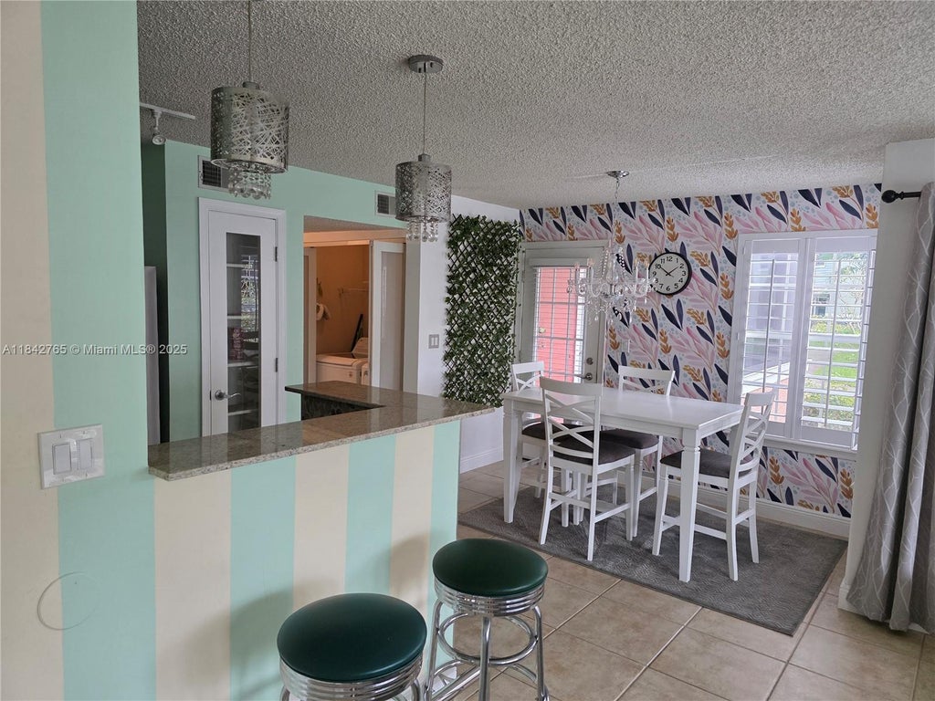Photo of 1365 Crystal Way #G, Delray Beach, FL 33444 (MLS # A11842765)