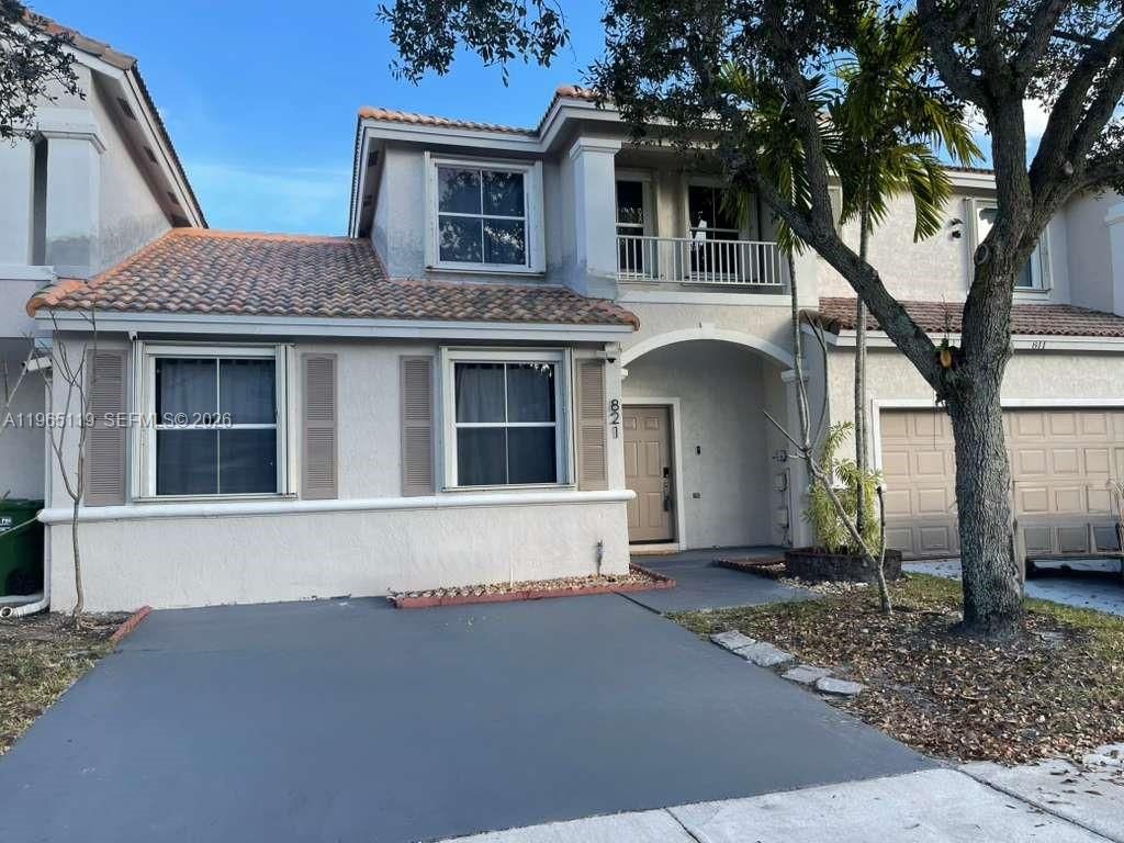 Photo of 821 NW 130th Ave #821, Pembroke Pines, FL 33028 (MLS # A11965119)