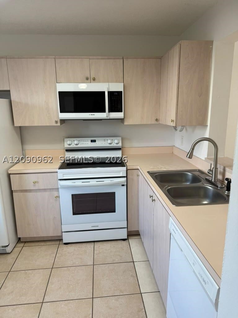 Photo of 8740 N Sherman Cir #102, Miramar, FL 33025 (MLS # A12090962)