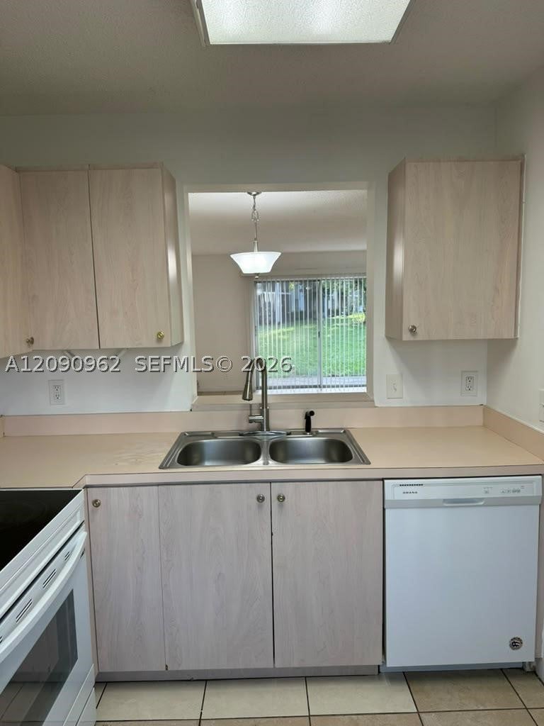 Photo of 8740 N Sherman Cir #102, Miramar, FL 33025 (MLS # A12090962)