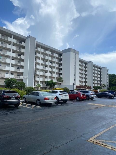 Large 2-bedroom 2-bathroom condominium on the golf course. Guard gated complex. 1st floor unit. Covered screened patio. Washer / dryer in unit. It is a "55+" development. Property is being sold "As Is". Call listing agent for details. Use "Showing Time" for showing instructions