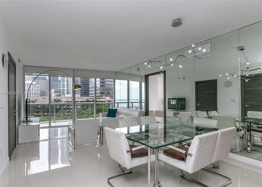Fully Furnished 2BD + Den with Bay Views at Icon Brickell
Move right into this beautifully furnished 2-bedroom, 2-bath condo with den at Icon Brickell Tower II. This 1,518 sqft unit features a split floor plan, custom closets, modern kitchen with Sub-Zero/Wolf appliances, and tile floors throughout. Enjoy stunning bay, ocean, and garden views from your private balcony.
Resort-style amenities include a massive pool deck, spa, gym, sauna, concierge, and top-tier dining like Cipriani. Walk to Brickell City Centre, restaurants, and more. 1 assigned parking spot. Pet-friendly. HOA includes water, cable, trash, and amenities.