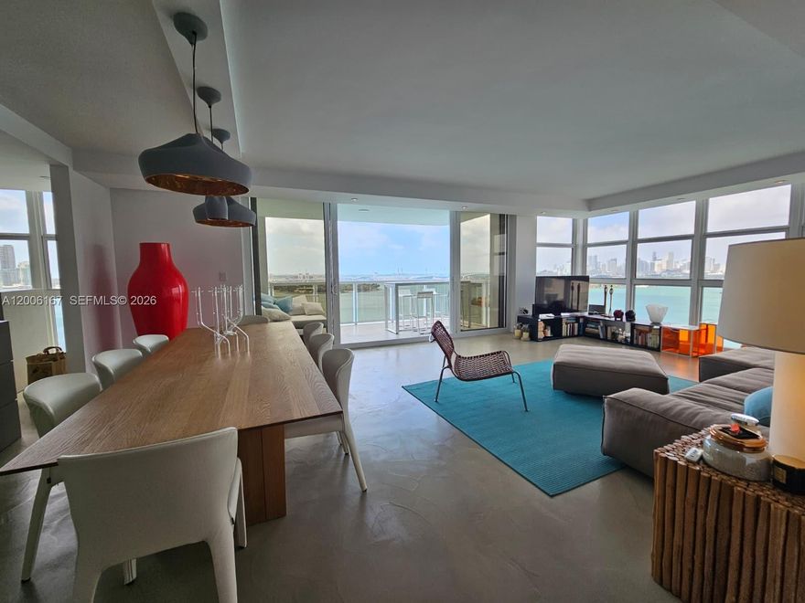 Experience elevated waterfront living in this fully and meticulously renovated corner residence, ideally positioned in the most desirable line of the building. This stunning 2-bedroom, 2.5-bathroom home showcases breathtaking, unobstructed bay views from every angle, filling the space with natural light and spectacular sunsets. Thoughtfully redesigned with a modern aesthetic, the apartment features high-end finishes, an open and functional layout, and seamless flow between living spaces, perfect for both everyday living and entertaining. The corner exposure enhances privacy and provides a unique sense of exclusivity rarely found. The spacious bedrooms offer comfort and tranquility, while the additional half bath adds convenience for guests. Every detail has been carefully curated to deliver a sophisticated and move-in-ready experience. Offered unfurnished, this residence is a blank canvas ready for your personal touch,an exceptional opportunity to own a truly turn-key, luxury waterfront home in a premier location.