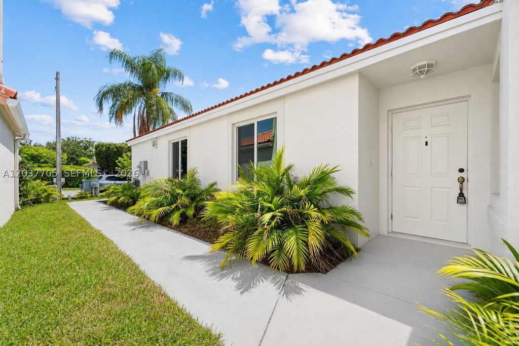 Photo of 15942 NW 21st St, Pembroke Pines, FL 33028 (MLS # A12037705)