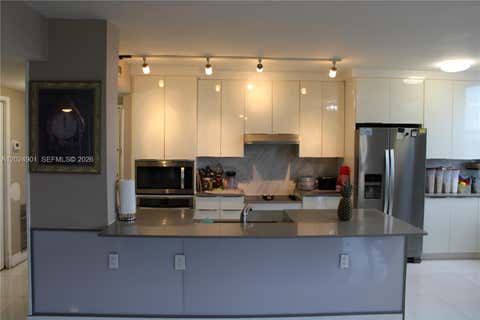 Photo of 4200 Hillcrest Dr #820, Hollywood, FL 33021 (MLS # A12024901)