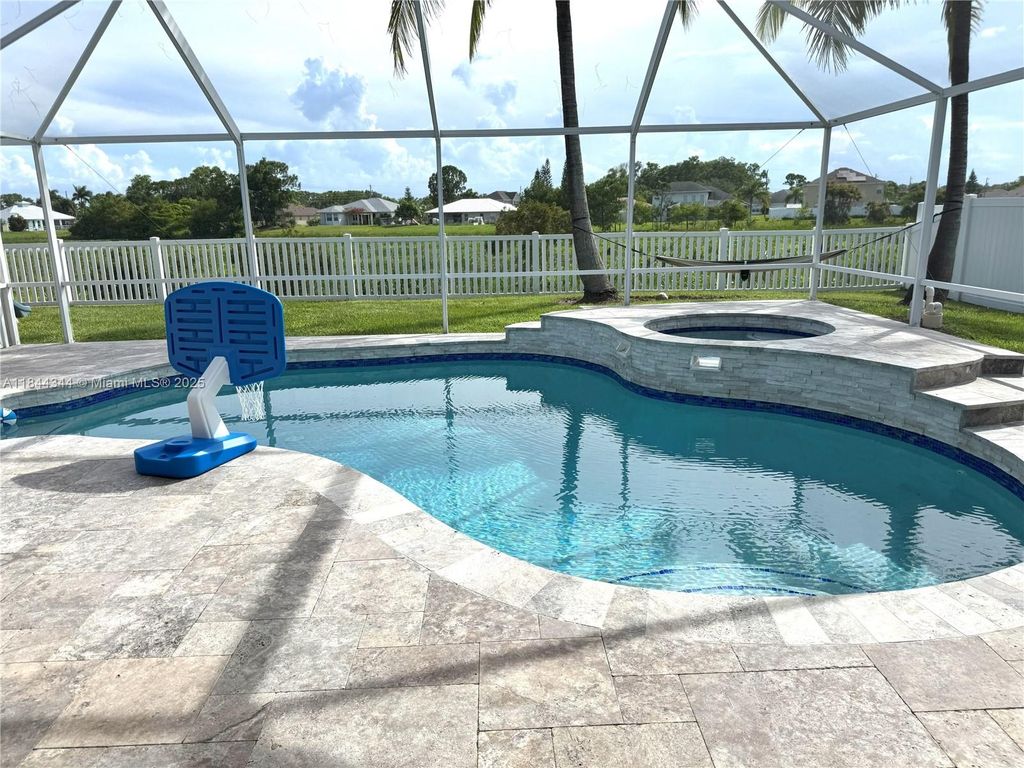 Photo of 5364 NW Rugby Dr, Port St Lucie, FL 34983 (MLS # A11844344)