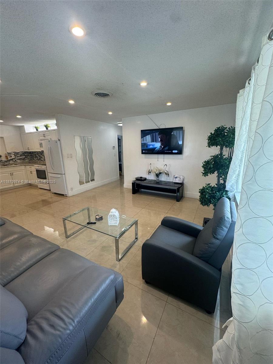 ALL AGEST COMMUNITY!! Beautiful single family home 2/2 open concept. Lake view . NEW ROOF 2024 . Close to the beach at Lauderdale By the Sea and Restaurants. The community offers tranquility the club house has a renovated pool. This is a must See!!! Call listing agent for an appointment. Showings after 5:00pm during week days and all day on weekends.
