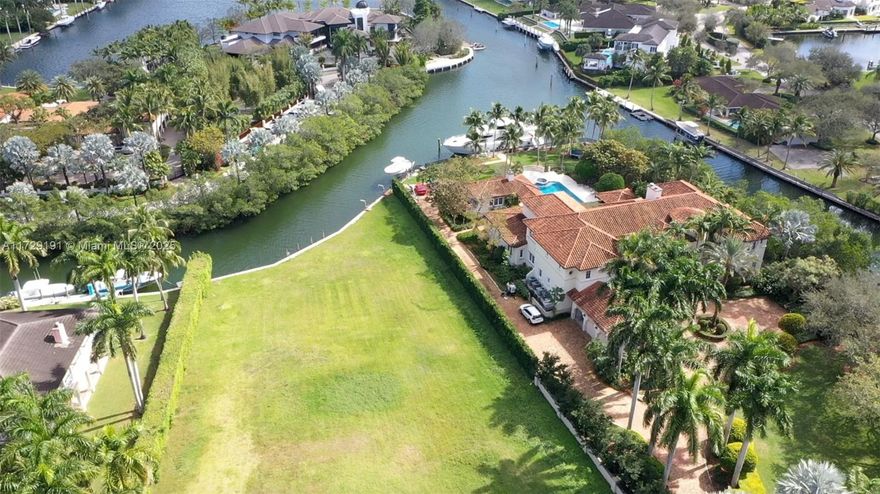 Welcome to a rare gem in the prestigious Gables Estates community. This expansive 43,200-square-foot lot boasts over 150 feet of breathtaking waterfront, offering unobstructed access to the shimmering Biscayne Bay. A boater’s paradise, this parcel presents an unparalleled opportunity to craft the home of your dreams in one of Florida’s most exclusive enclaves. City permits approved ready to start construction.