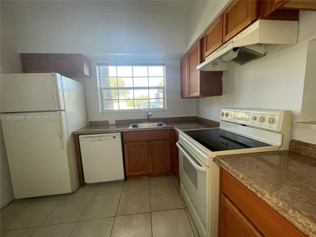 Photo of 640 Cypress Club Way #F12, Deerfield Beach, FL 33064 (MLS # A12012899)