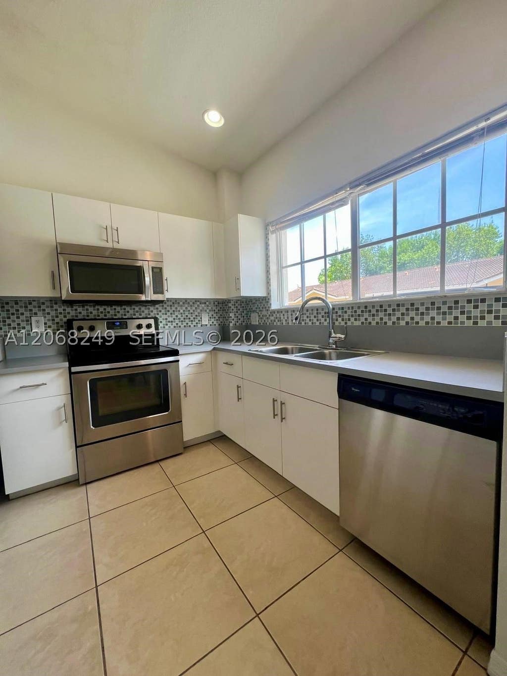 Photo of 3824 SW 48th Ave #3824, Hollywood, FL 33023 (MLS # A12068249)