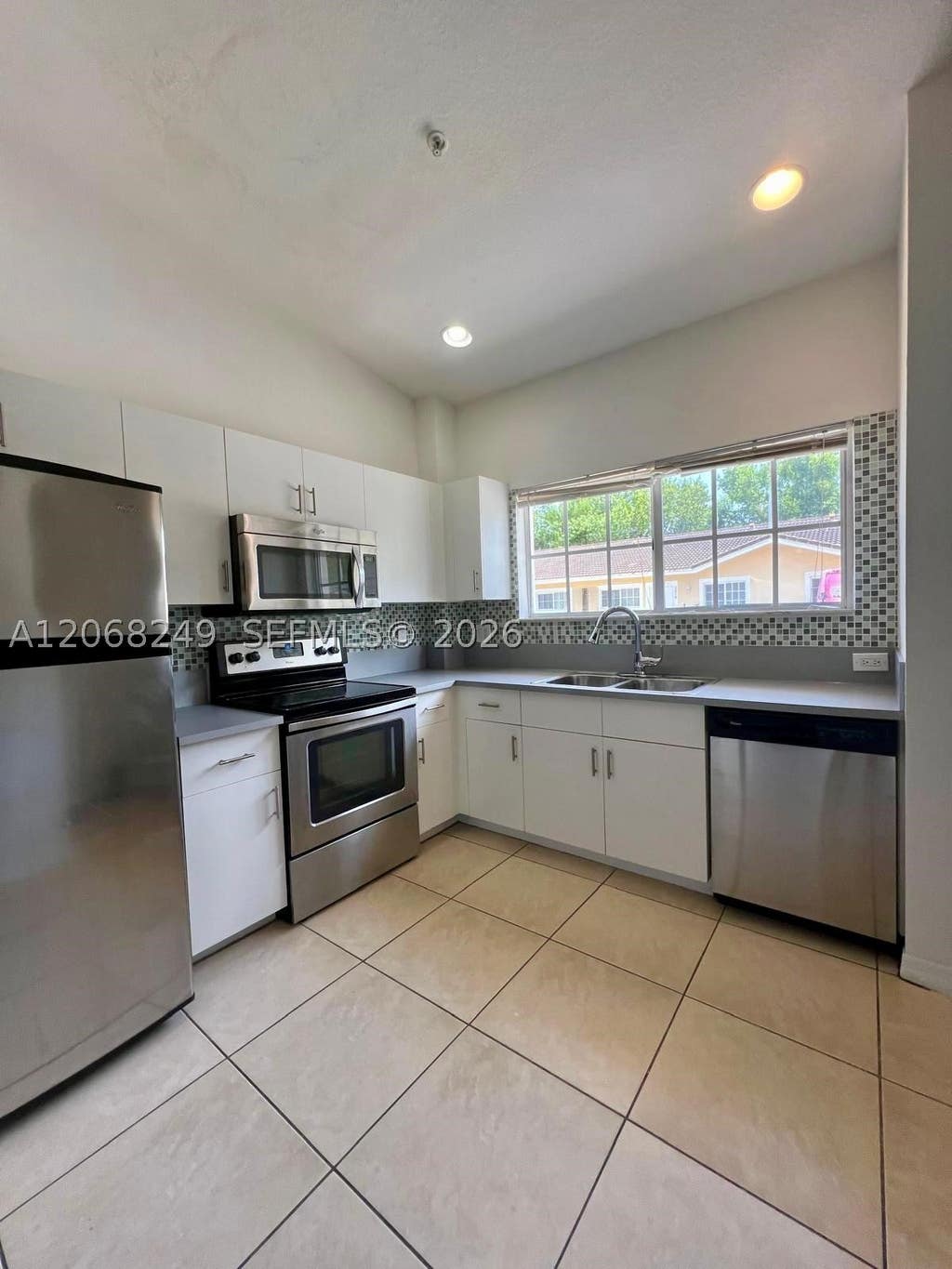 Photo of 3824 SW 48th Ave #3824, Hollywood, FL 33023 (MLS # A12068249)