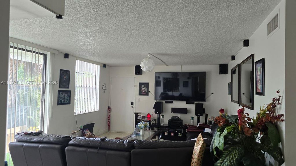 Photo of 1748 NW 55th Ave #101, Lauderhill, FL 33313 (MLS # A11988112)
