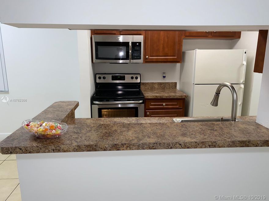 Stunning and recently renovated condo 1/1 in the fantastic community of Sun Vista Gardens. Open kitchen, newer stainless steal appliances, newer laminate and tile floors, freshly painted, washer & dryer inside, open balcony. Gated Community that features basketball and tennis courts, clubhouse, gym, swimming pool and spa. Close to Turnpike, major roads, supermarkets, restaurants and schools. First month and two security deposits are required to move in (3 months total). Pets are welcome with a No-refundable pet fee.