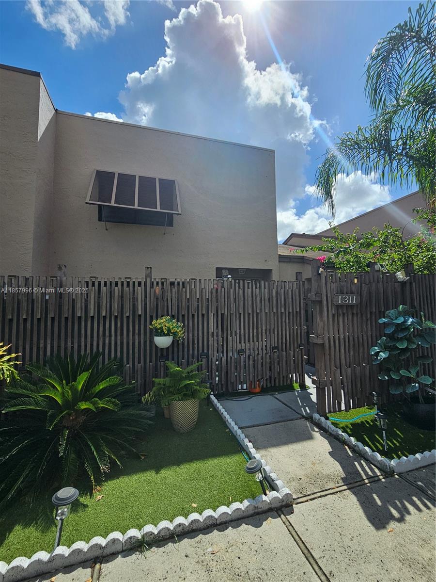 Beautiful three-bedroom, two-and-a-half-bath townhouse, with a beautiful view of the lake in a gated community with a pool, gym, and tennis courts. The Flamingo Villas Community. Great location! Very desirable area with excellent schools, shopping, restaurants, entertainment and hospital close by. Low HOA.