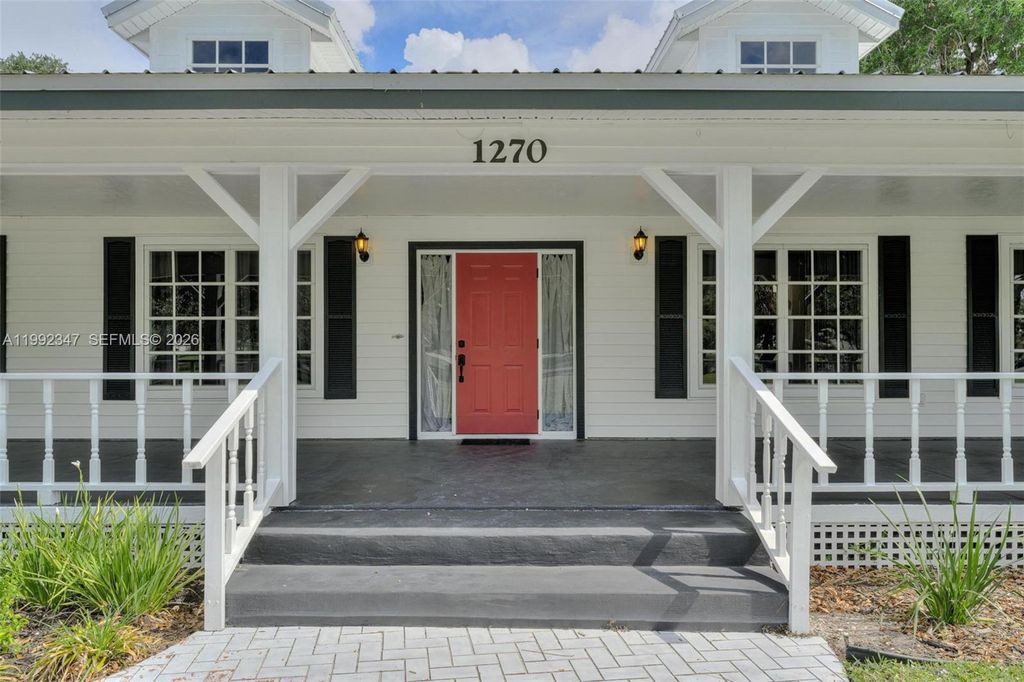 Photo of 1270 Riverbend Drive, La Belle, FL 33935 (MLS # A11992347)