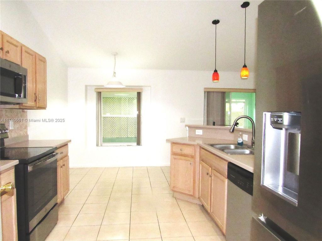 Photo of 2721 SW Pierson Rd, Port Saint Lucie, FL 34953 (MLS # A11740551)