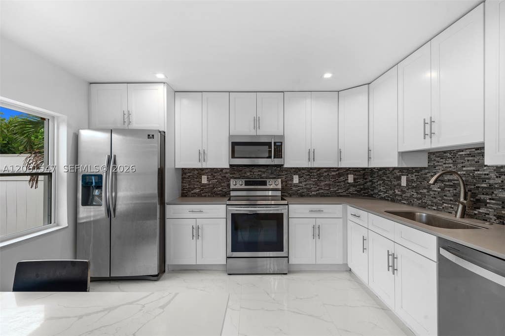 Photo of 524 NW 10th St #0, Hallandale Beach, FL 33009 (MLS # A12061547)